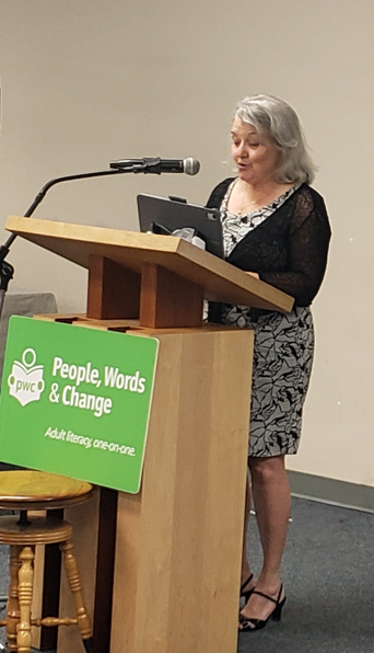 photo of Brigid Hayes from Peter Gzowski Foundation speaking at the podium at the event