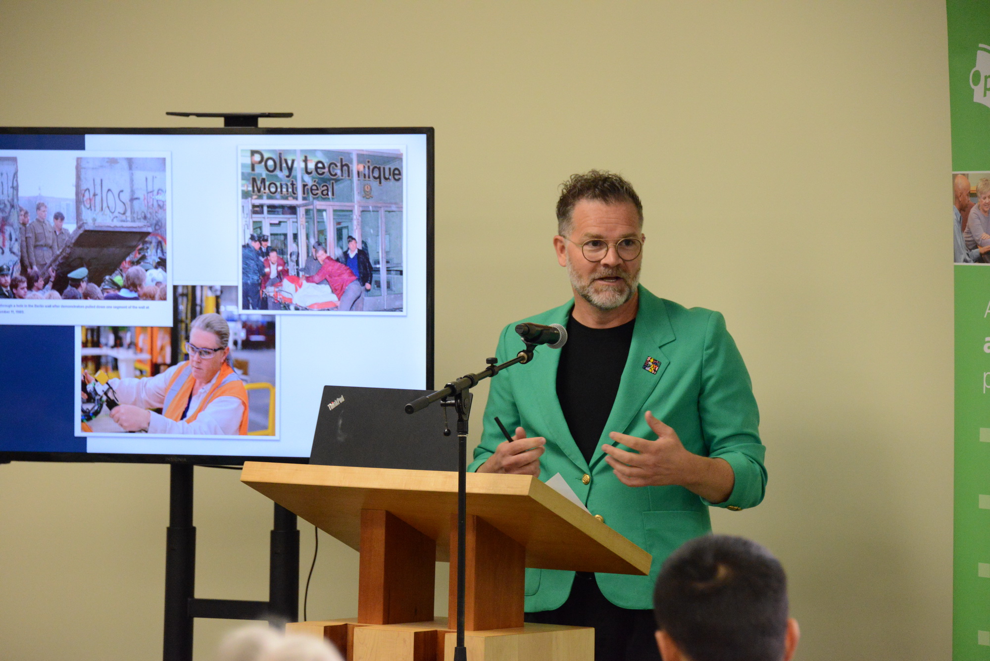 keynote speaker Matthew Pearson with image of his slide show in background